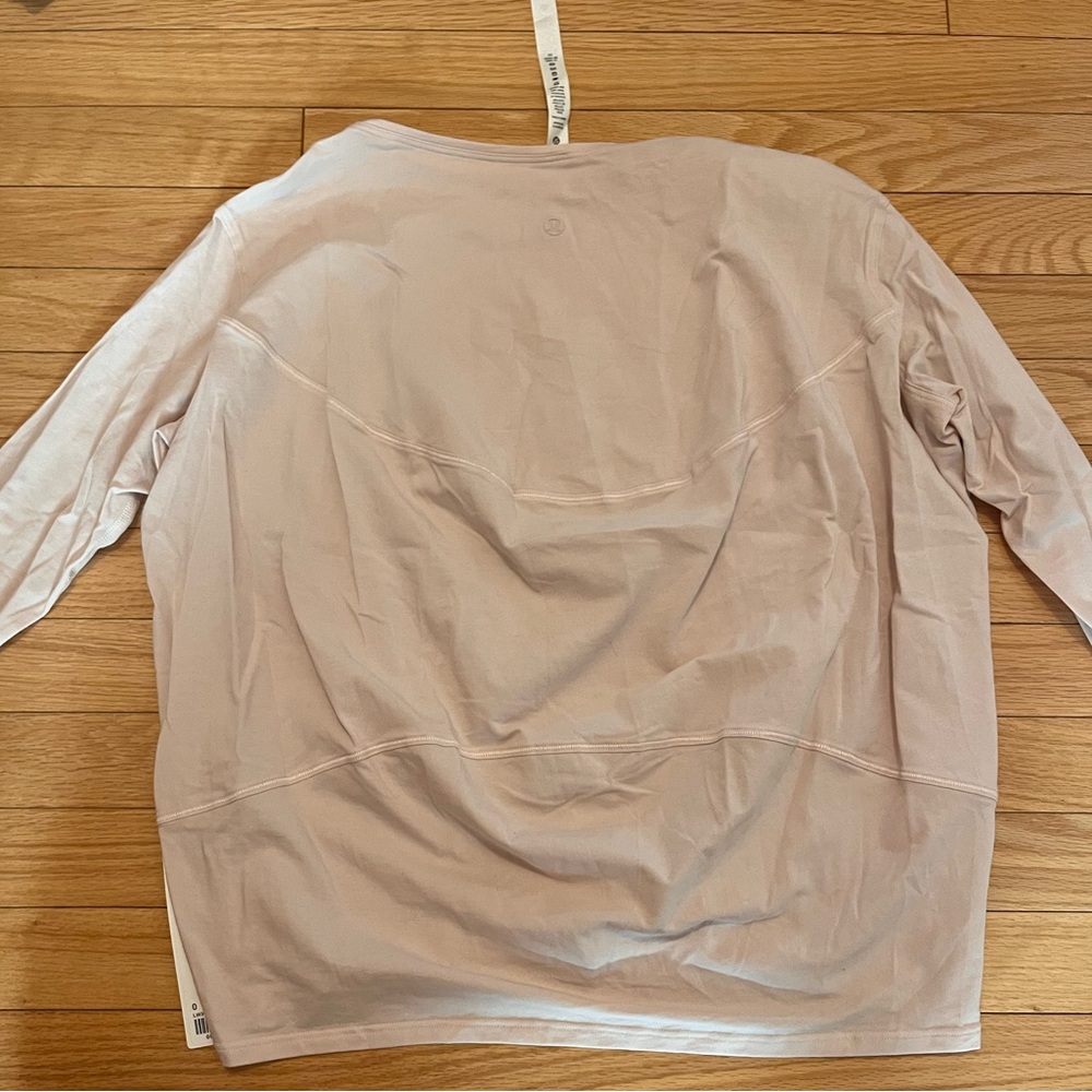 Lululemon back in action long sleeve top feathered pink size 0 NWT